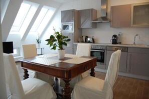 Apartemen, 1 kamar tidur | Makan di kamar