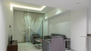 Junior Suite, 1 King Bed, Garden View | Living room - Nordlicht Hotel North Coast (Al-Hammam)