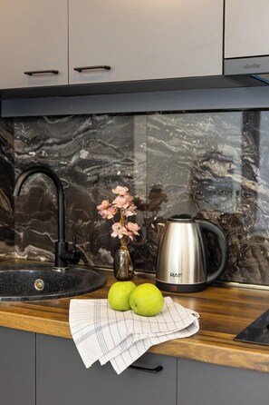 Executive Apartment, 1 Bedroom | Private kitchen | Fridge, microwave, coffee/tea maker, electric kettle