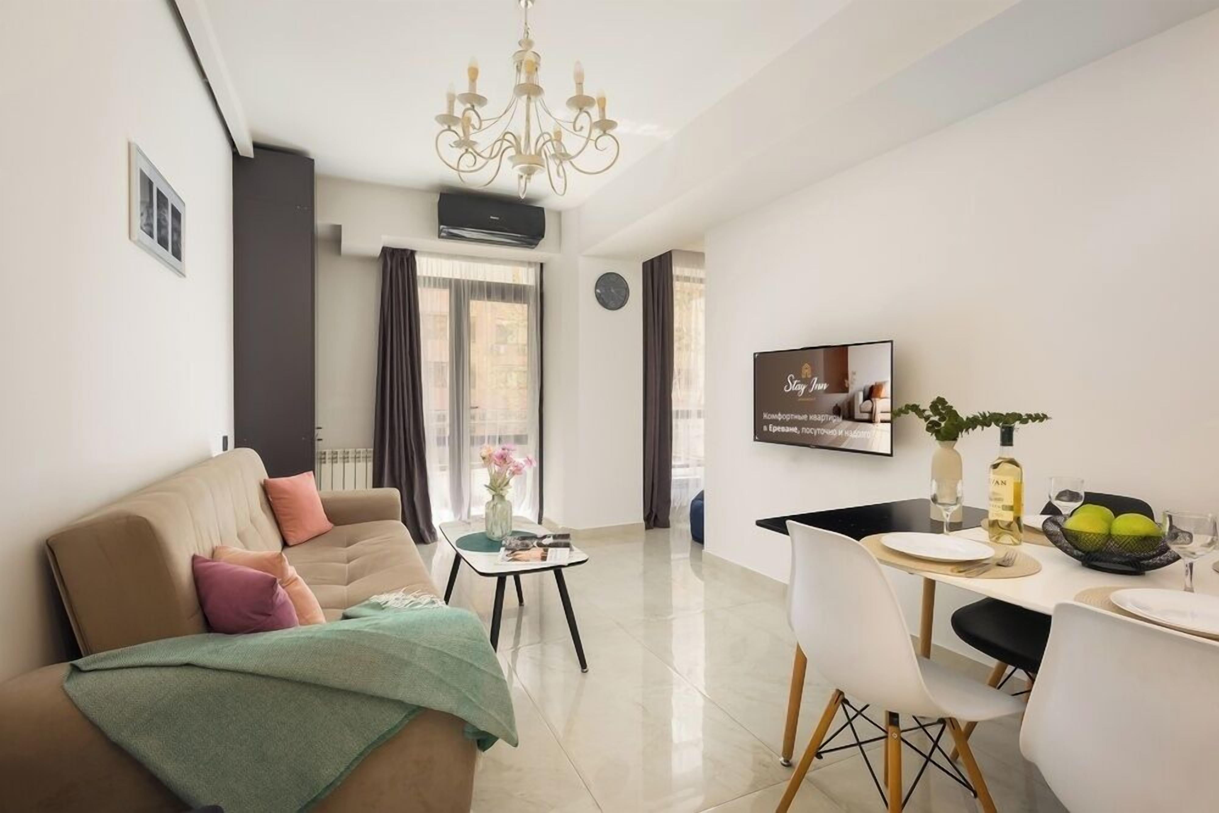 Executive Apartment, 1 Bedroom | Living area | 40-inch flat-screen TV with cable channels, pay films