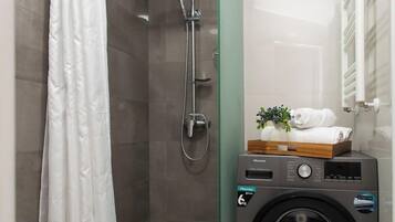 Executive Apartment, 1 Bedroom | Bathroom | Free toiletries, hair dryer, slippers, towels