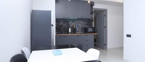 Executive Apartment, 1 Bedroom | Private kitchen | Fridge, microwave, coffee/tea maker, electric kettle