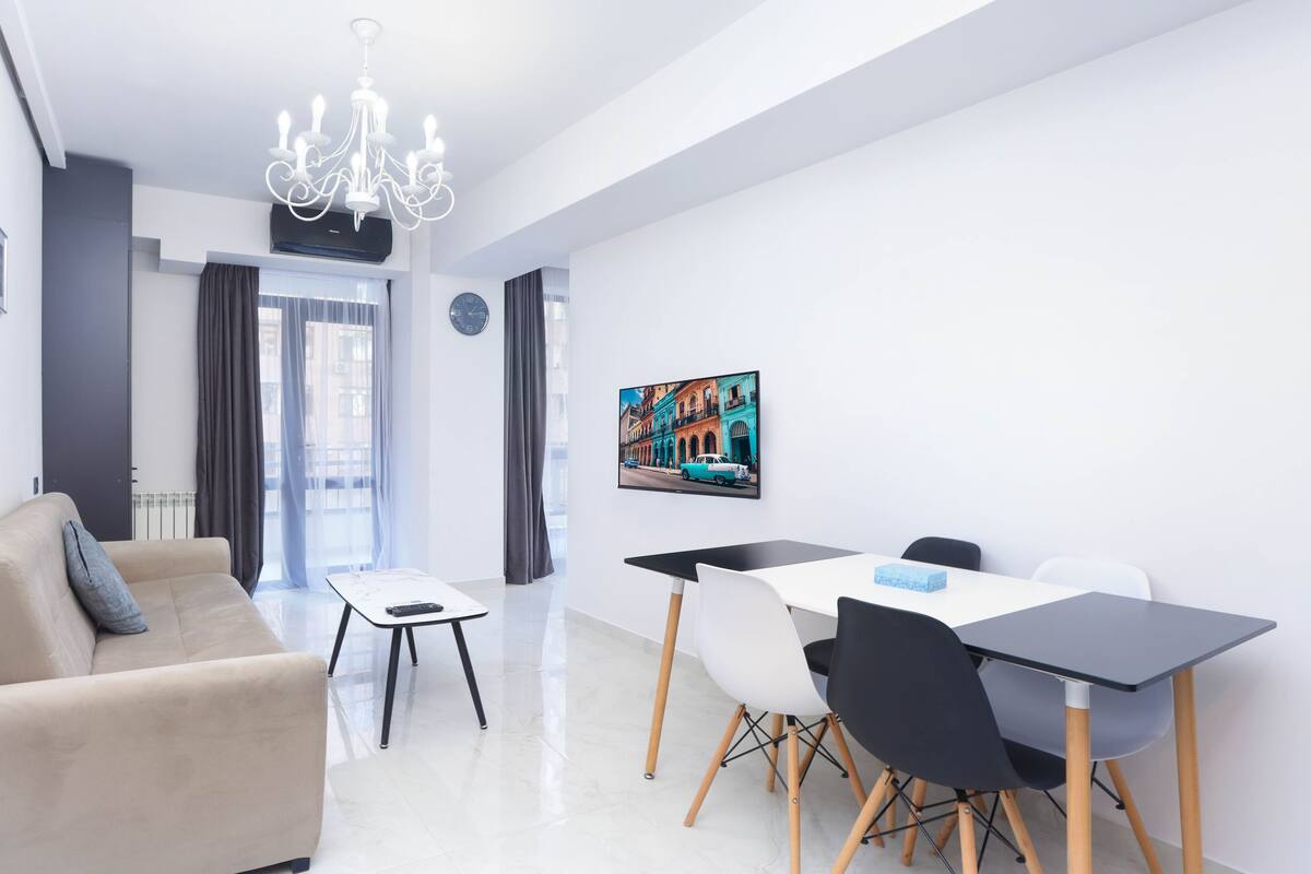 Appartamento Executive, 1 camera da letto | Area soggiorno | TV a schermo piatto 40 pollici con canali via cavo, film pay-per-view