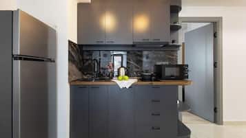 Executive Apartment, 1 Bedroom | Private kitchen | Fridge, microwave, coffee/tea maker, electric kettle