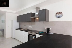 Fridge, microwave, toaster, cookware/dishes/utensils