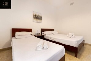 Desk, iron/ironing board, travel cot, free WiFi