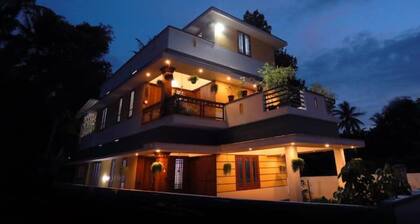 Family friendly Homestay with Homely food Near by Kovalam bypass Trivandrum