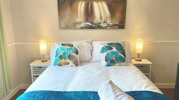 4 bedrooms, desk, iron/ironing board, travel crib