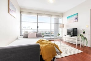 2 habitaciones, tabla de planchar con plancha, wifi y ropa de cama