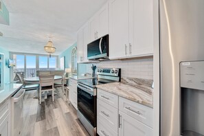Fridge, microwave, oven, stovetop - Island Shores 652: Beach Front Balcony: Stunning Gulf Views, Pool, Free Parking (Gulf Shores)