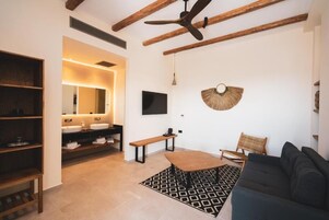 Suite, 2 Bedrooms, Sea View with a private pool | Living area | 45-inch flat-screen TV with satellite channels, TV