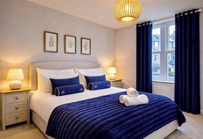 2 slaapkamers, een strijkplank/strijkijzer, gratis wifi, beddengoed