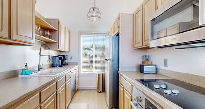 Stunning ocean-view home with W/D, sauna, tennis court, & patio - beach access