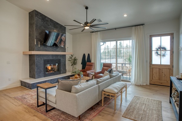 Gather in the great room to sit around the fire, lounge or watch the smart TV.