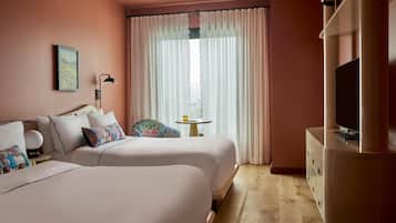 Hypo-allergenic bedding, in-room safe, desk, laptop workspace