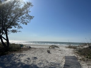 On the beach, sun loungers, beach towels