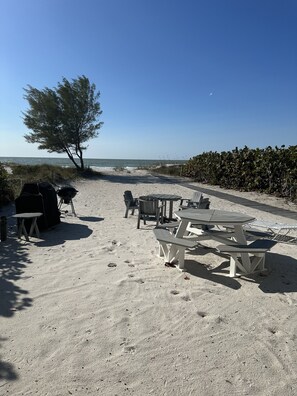 On the beach, sun-loungers, beach towels