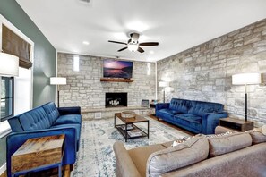 Smart TV, fireplace, table tennis, books