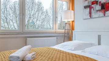 2 quartos, berço de viagem, Wi-Fi, roupa de cama