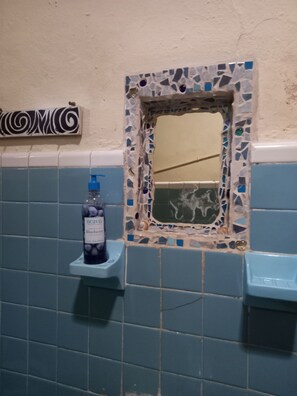 Shower, rainfall showerhead, towels, soap