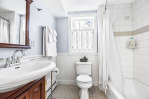 Jetted bath, hair dryer, towels, soap
