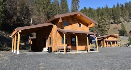 Modern log cabin with a cozy cabin feel along the Clearwater River.