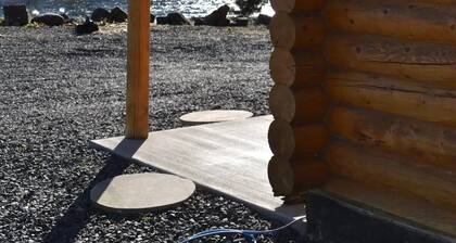 Modern log cabin with a cozy cabin feel along the Clearwater River.