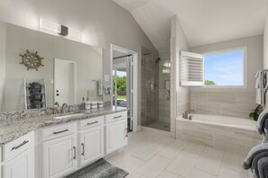 Shower, jetted tub, hair dryer, towels