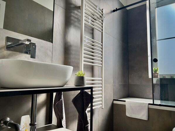 Hair dryer, towels, soap, shampoo
