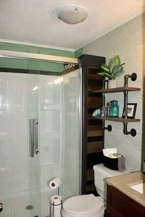 Shower, hair dryer, towels, soap