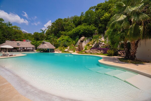 2 outdoor pools, open 9:00 AM to 10:00 PM, pool umbrellas, sun loungers
