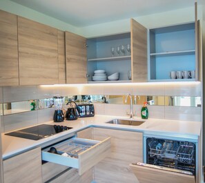 Apartment, 1 Queen Bed | Private kitchen | Fridge, microwave, oven, stovetop