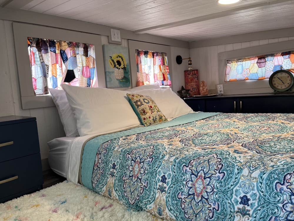 Room, “SERENDIPITY” a boho inspired tiny home on wheels in country setting