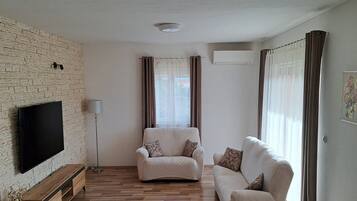 House (Three Bedroom Holiday Home with Terra) | Living room | TV