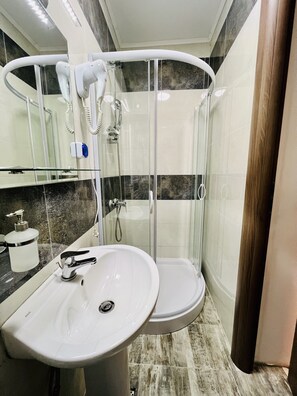 Select Comfort beds, blackout drapes, iron/ironing board, free WiFi