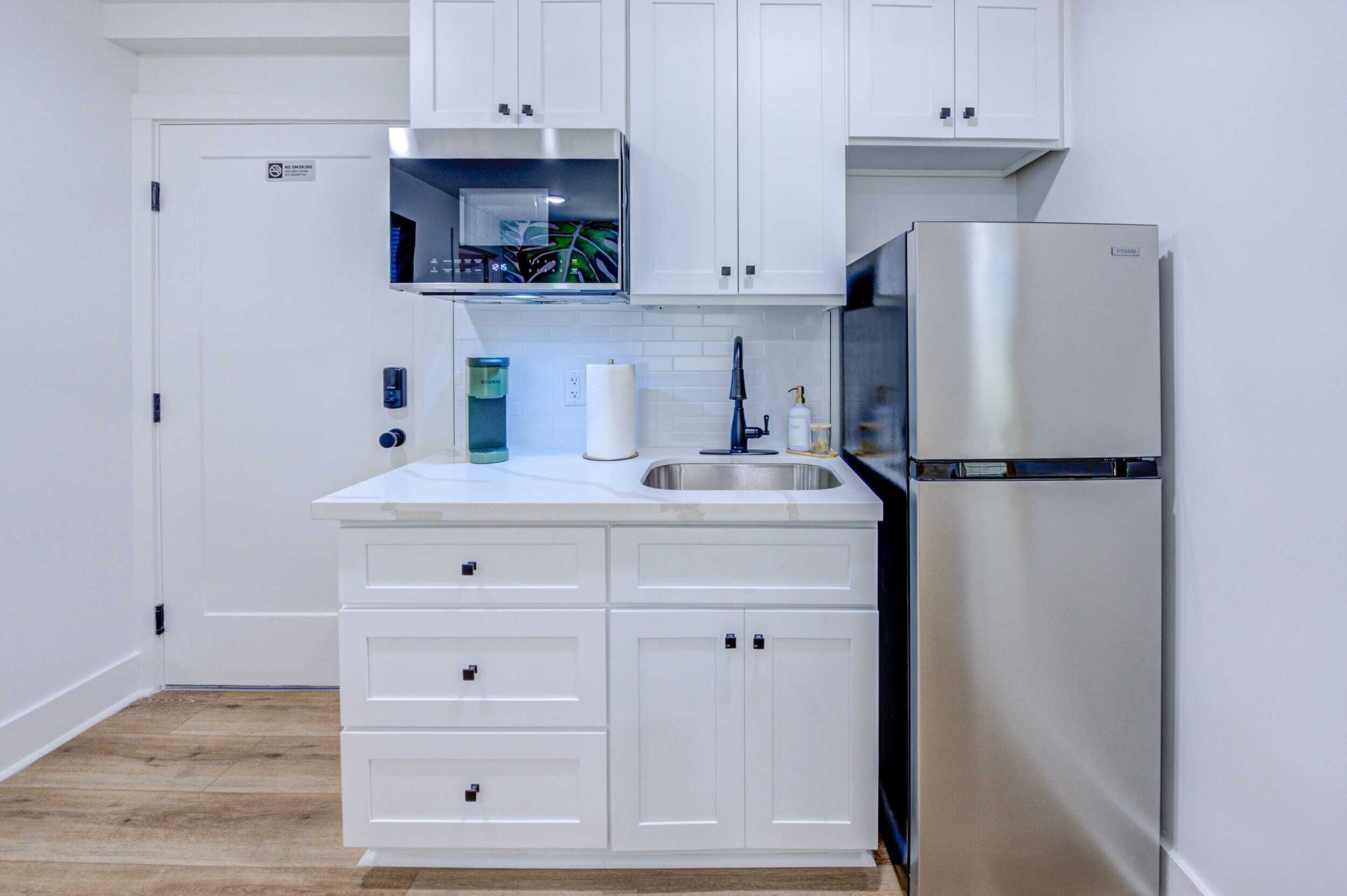 Fridge, microwave, coffee/tea maker, toaster