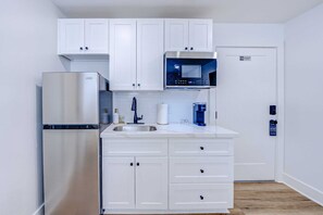 Fridge, microwave, coffee/tea maker, toaster