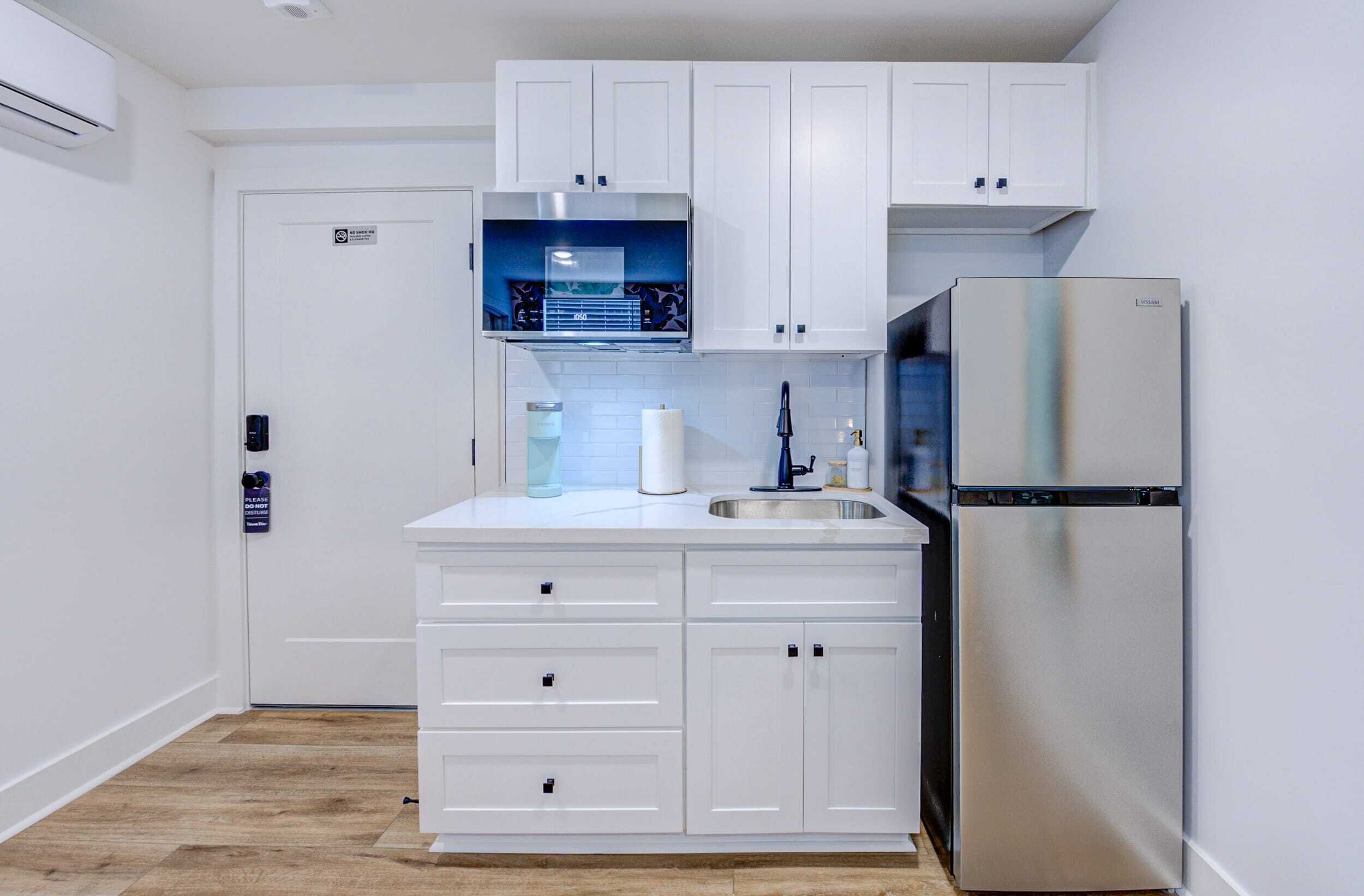 Fridge, microwave, coffee/tea maker, toaster