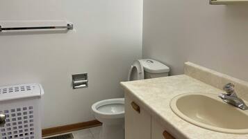 Signature Room | Bathroom | Combined shower/tub, hair dryer, towels, soap