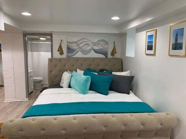 1 bedroom, desk, iron/ironing board, travel crib