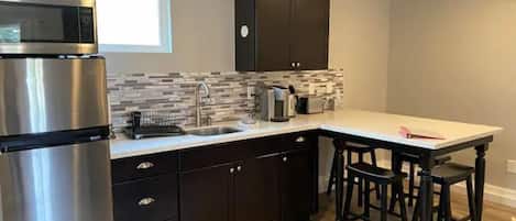 Fridge, microwave, coffee/tea maker, electric kettle