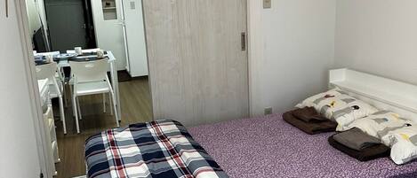 1 bedroom, desk, iron/ironing board, bed sheets