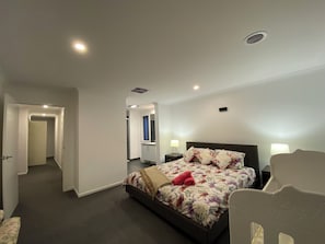 4 bedrooms, desk, iron/ironing board, travel crib