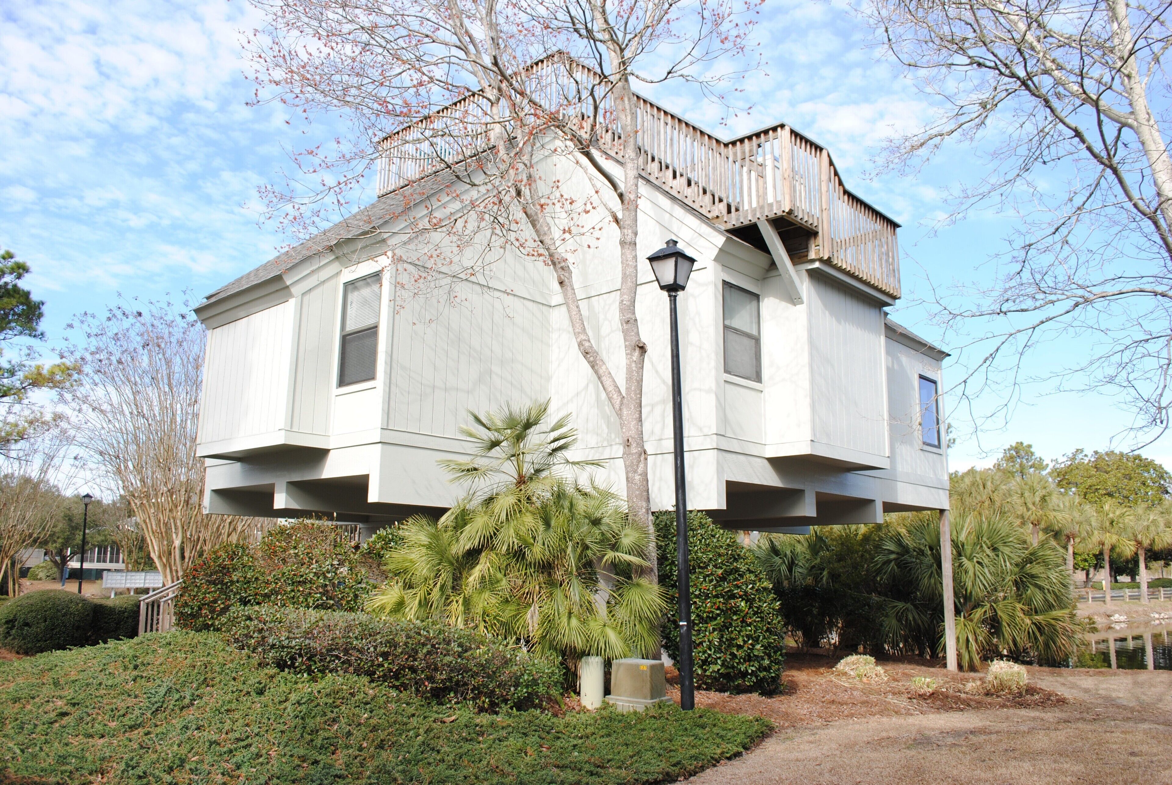 Villa with 2 decks including full roof deck & community pool access located in Litchfield By the Sea
