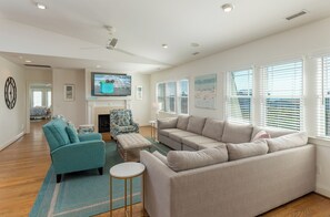 TV, offices - Hobbs Realty - “Holden 5” | Elegant Stay w/ Elevator, Private Heatable Pool & Panoramic Views (Holden Beach)