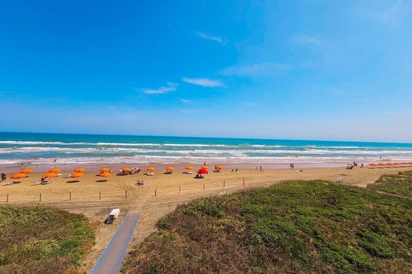 On the beach, sun loungers