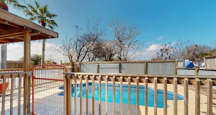 Dog-friendly retreat with a private pool, fenced yard, & AC - close to fishing