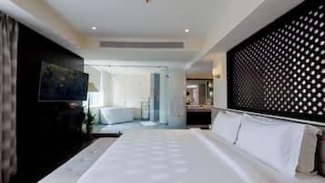 Ylelliset vuodevaatteet, pillowtop-patjalliset sängyt, minibaari