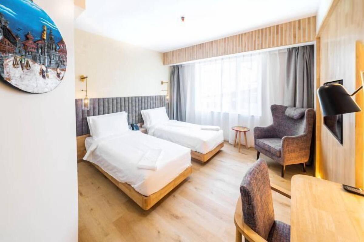 Premium bedding, pillow-top beds, minibar, in-room safe