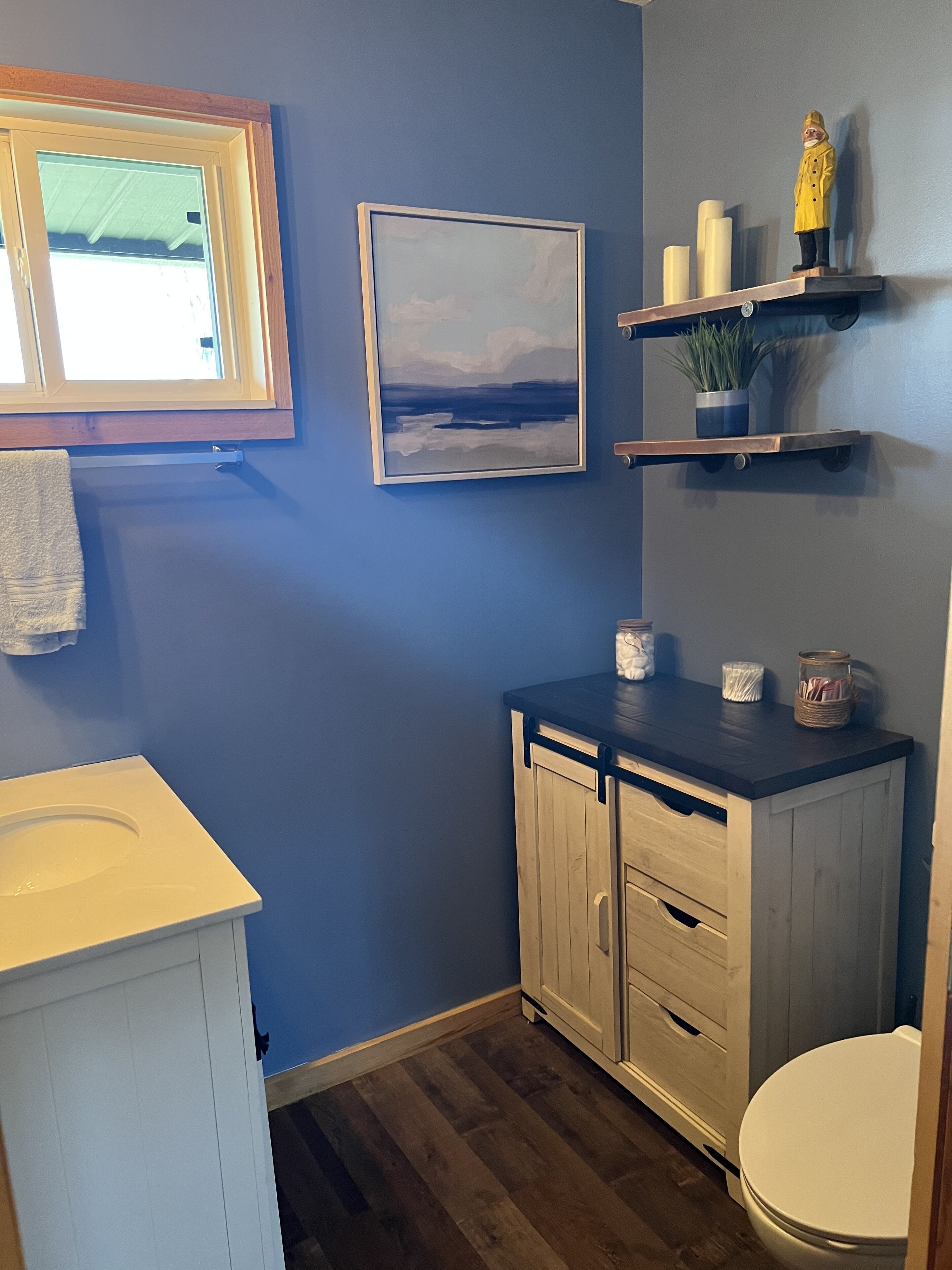 Shower, hair dryer, towels, toilet paper